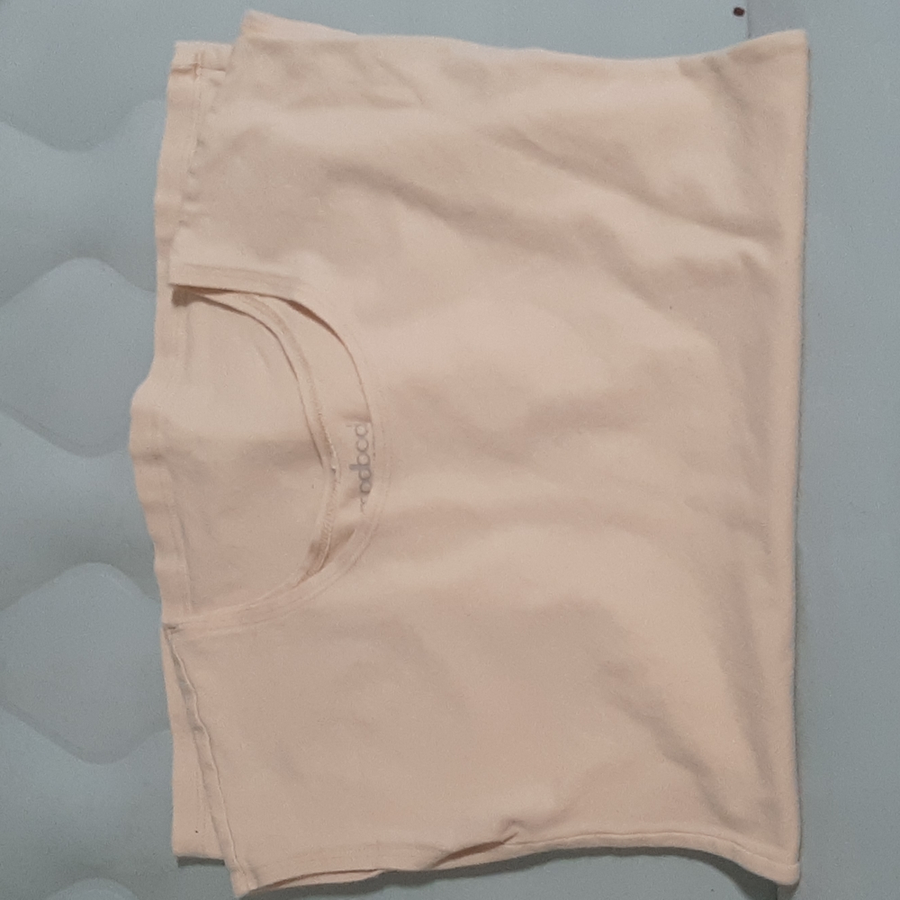 Cream colored half sleeved tank top